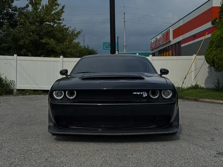 Dodge Hellcat with a light-up grille badge wired to the running lights by MarxModified